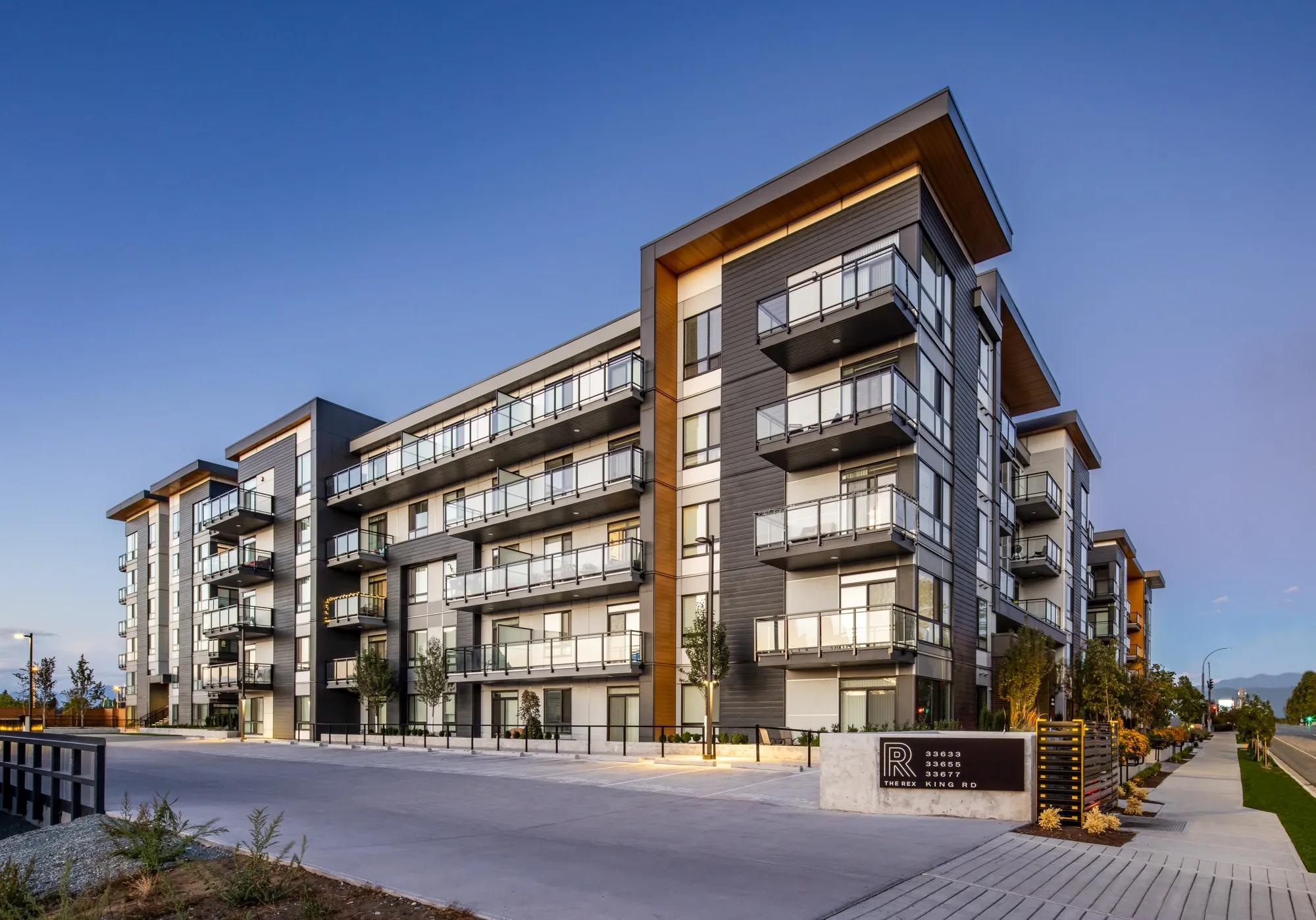 The Rex multi-family exterior at dusk